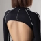 Комбинезон GIG спортивный с длинным рукавом и декоративными белыми швами. Чёрный